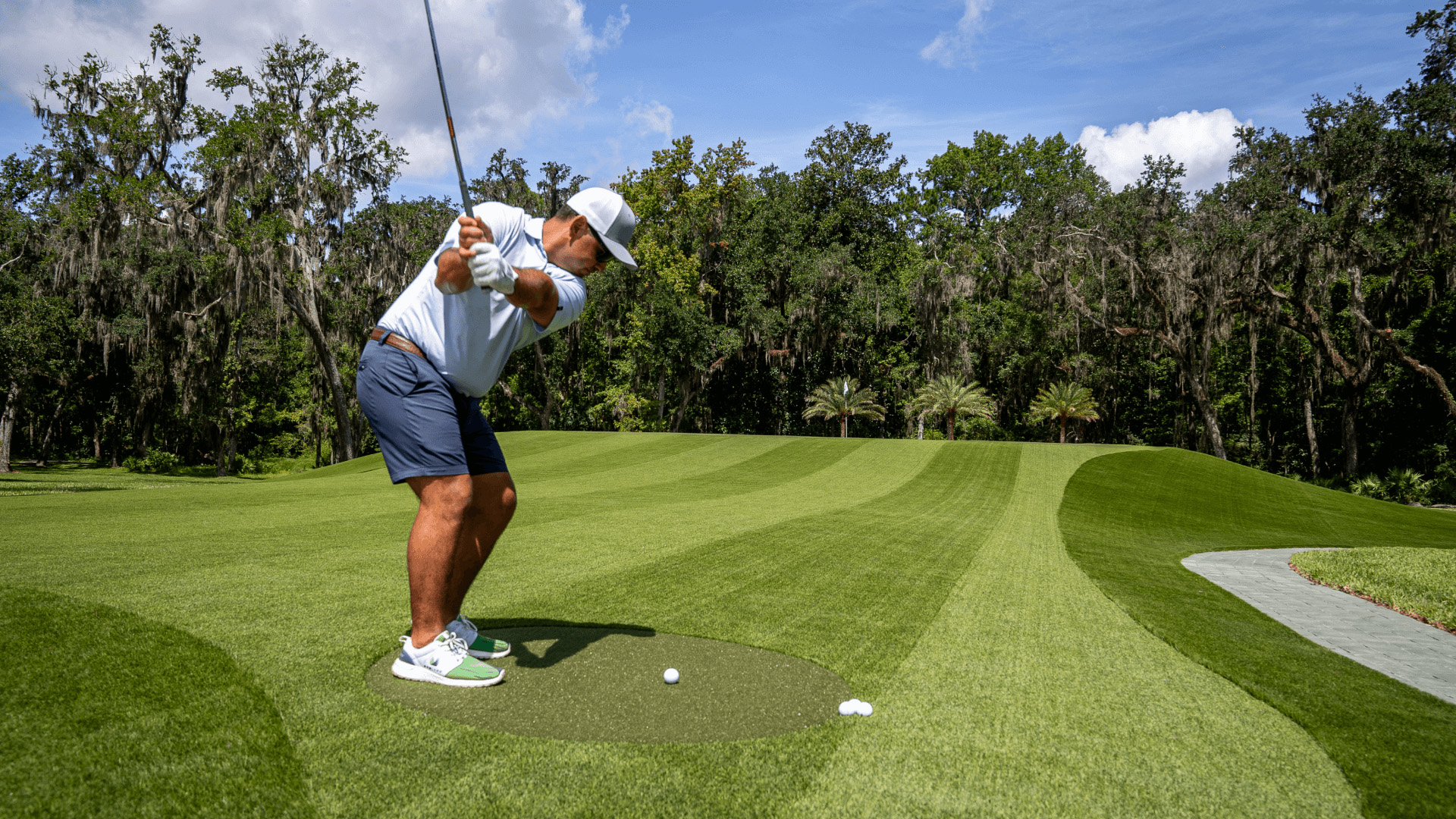 Golfer on SYNLawn synthetic turf fairway